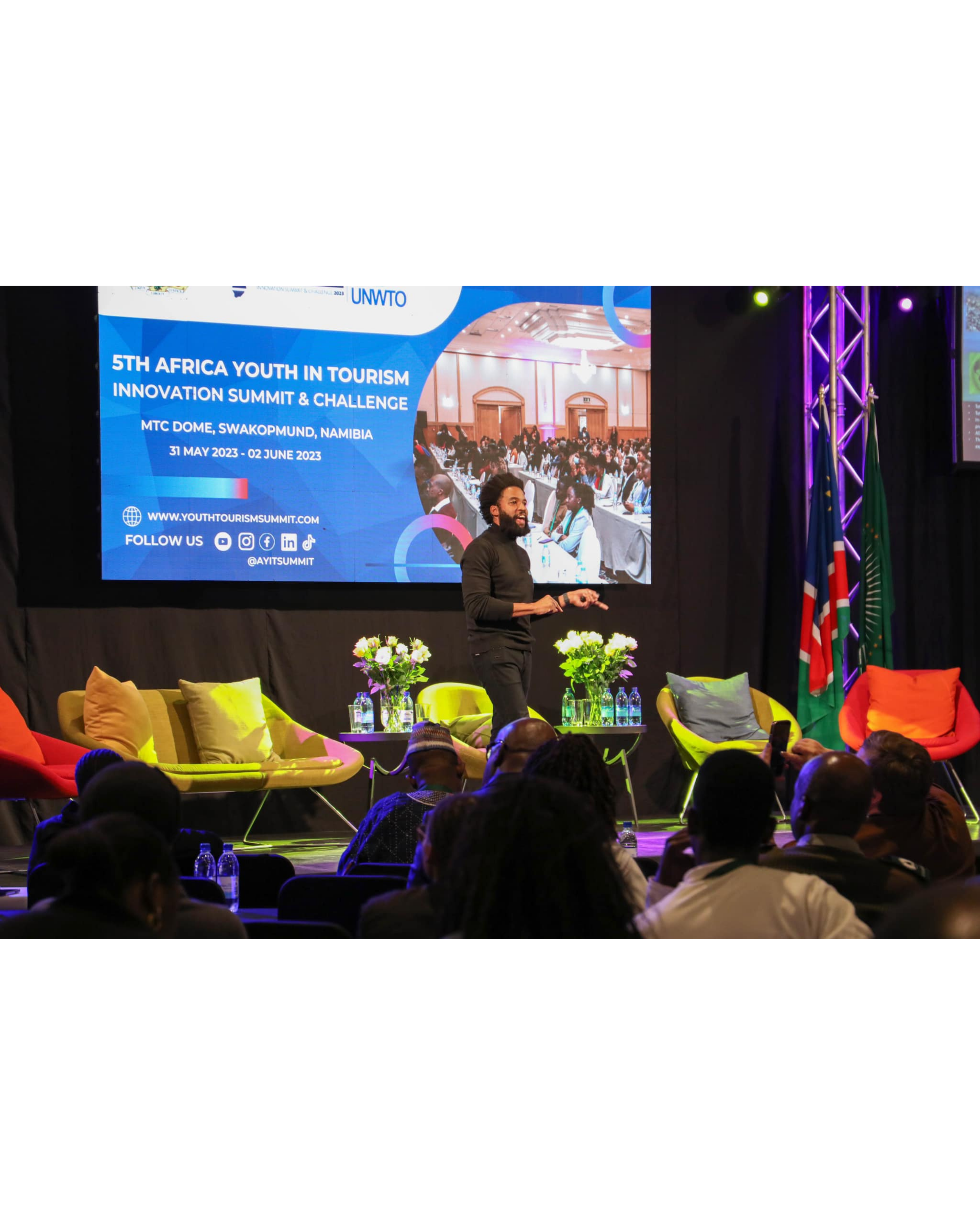 Denim Richards keynoting the UNWTO Africa Youth in Tourism Innovation Summit in Namibia